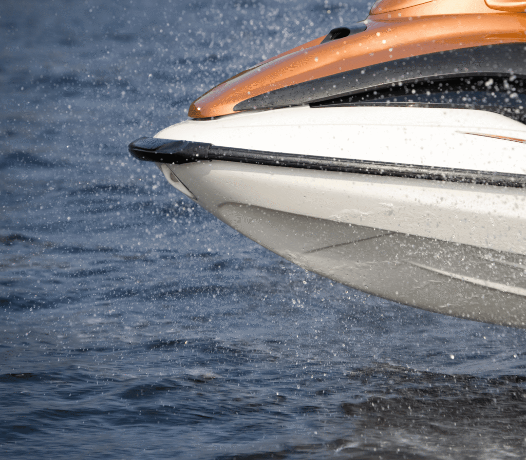 Bow Of A Boat Speeding Across The Water