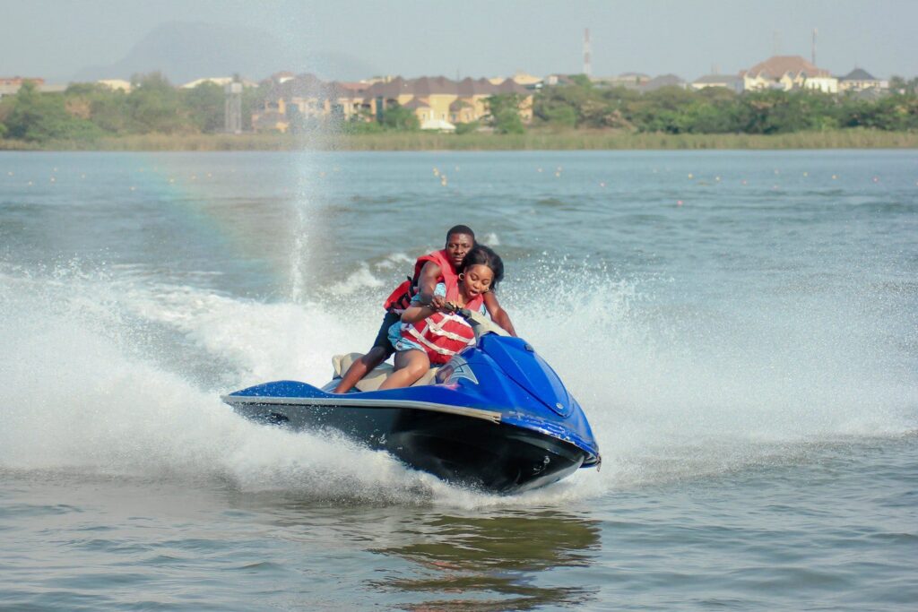 Jet Ski Speeding Across Water With A Big Spray