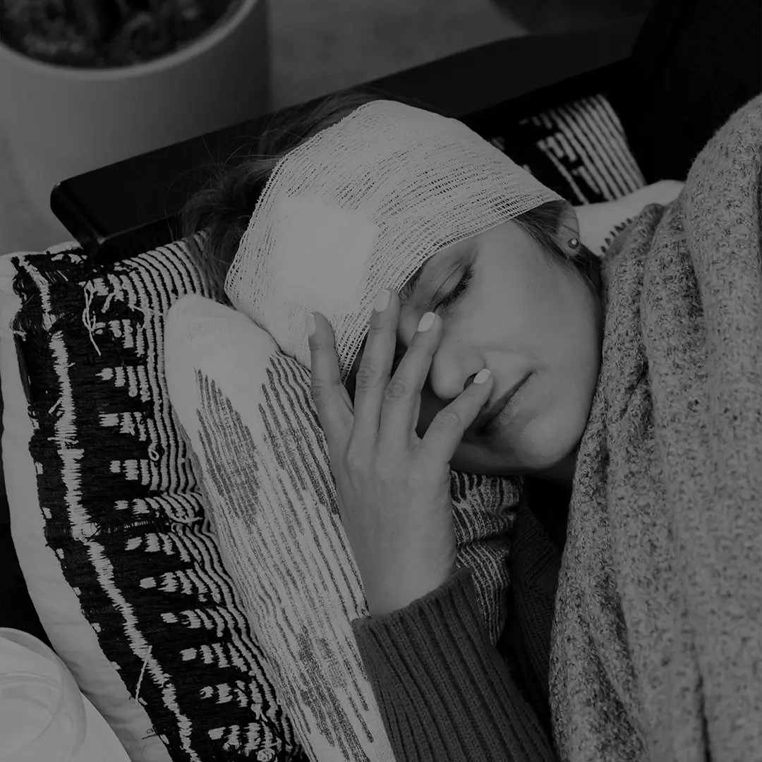 Person Resting Their Head After A Car Accident