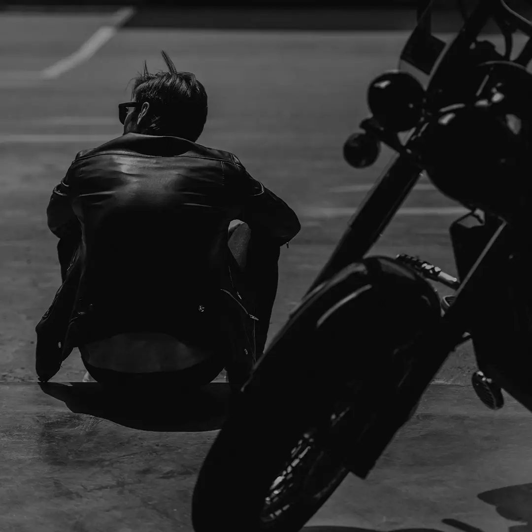 Motorcyclist Riding On A Highway, Black And White